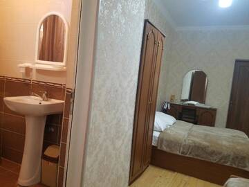 Фото номера Трехместный номер с ванной комнатой Гостевой дом Guest House Maria г. Сигнахи 6
