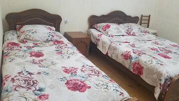 Фото номера Четырехместный номер с ванной комнатой Гостевой дом Guest House Maria г. Сигнахи 5