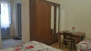Фото номера Четырехместный номер с ванной комнатой Гостевой дом Guest House Maria г. Сигнахи 6