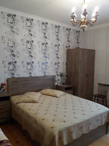 Фото номера Четырехместный номер Гостевой дом Martinichi Guest House г. Сигнахи 3