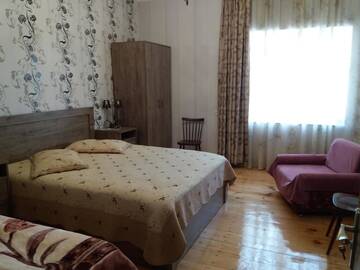 Фото номера Четырехместный номер Гостевой дом Martinichi Guest House г. Сигнахи 8