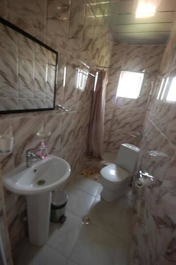 Фото номера Двухместный номер с 1 кроватью Гостевой дом Lelis Guest House г. Сигнахи 23
