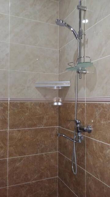 Фото номера Четырехместный номер с ванной комнатой Гостевой дом Tsminda Giorgi Apartment г. Сигнахи 7