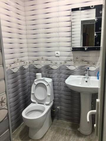 Фото номера Трехместный номер с ванной комнатой Гостевой дом Guest House Irma г. Сигнахи 10