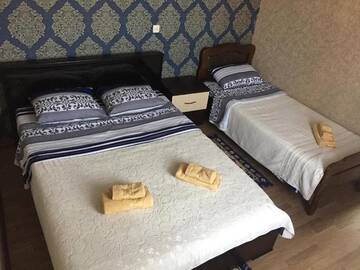 Фото номера Трехместный номер с собственной ванной комнатой Гостевой дом Guest House Loza г. Сигнахи 13