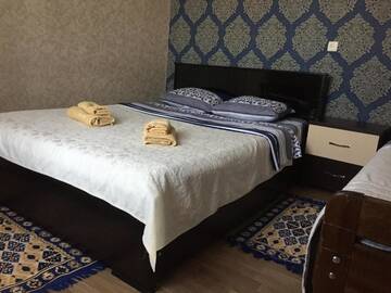 Фото номера Трехместный номер с собственной ванной комнатой Гостевой дом Guest House Loza г. Сигнахи 14