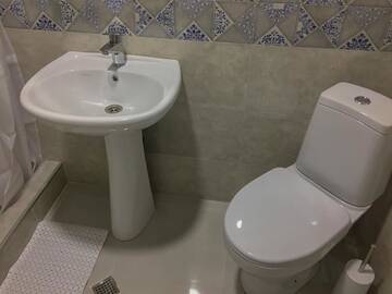 Фото номера Cемейный номер с собственной ванной комнатой Гостевой дом Guest House Maradona г. Сигнахи 7