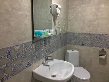 Фото номера Cемейный номер с собственной ванной комнатой Гостевой дом Guest House Maradona г. Сигнахи 9