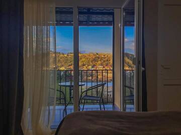 Фото номера Двухместный номер с 1 кроватью и балконом Гостевой дом Guest House Maradona г. Сигнахи 33