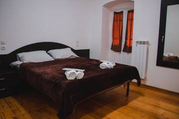 Фото номера Номер Делюкс Отели типа «постель и завтрак» GUEST HOUSE г. Сигнахи 5