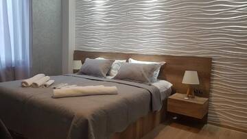 Фото номера Двухместный номер Делюкс с 1 кроватью Отель Hotel Traveler г. Сигнахи 2